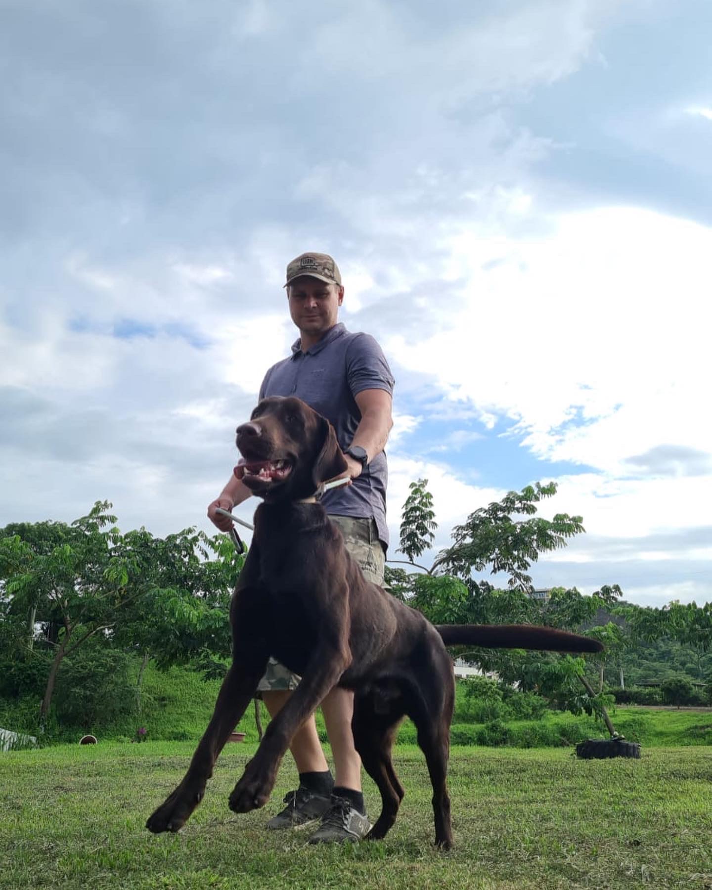 Vitalii training doberman
